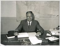 Mires Rosenthal at Desk