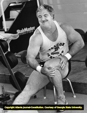 Jeff Van Note warms up before practice at the Falcons' training facility, 1986