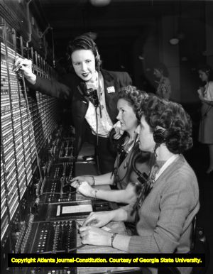 Telephone operators working at a switchboard, 1946
