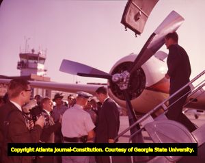 Senator John F. Kennedy arriving via plane in LaGrange, 1960