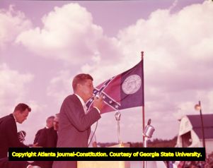 Senator John F. Kennedy addresses the crowd upon arrival at the LaGrange airport, 1960