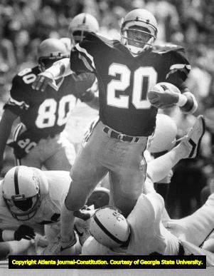Georgia Tech's Robert Lavette gets tripped by Alabama's Britton Cooper, 1984