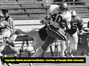 Georgia Techs' Eddie Lee Ivery breaks through the Miami Hurricanes defensive line, 1978