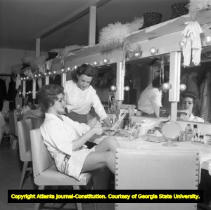 Las Vegas showgirl relaxing backstage before the performance, 1962