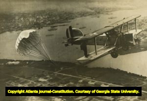 Missile fired out of U.S. military plane parachutes to ground, 1940.
