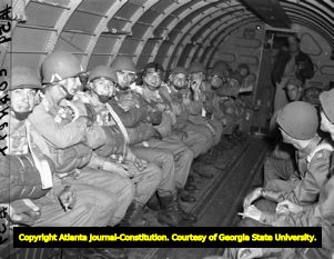 Paratroopers waiting to jump out of an aircraft during training, 1942
