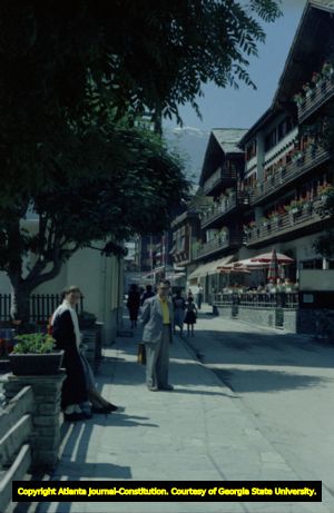 Pedestrians walking along the streets of Zermatt, 1960