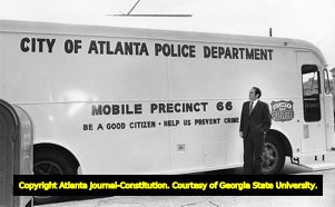 Community unrest prompts Mayor Sam Massell to issue a mobile police van in the Summerhill neighborhood, 1970