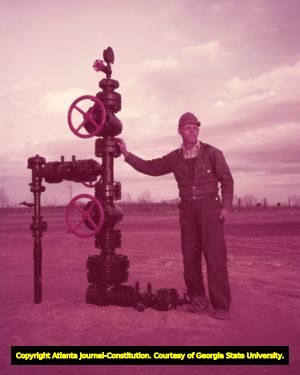 Farmer and oil driller Allen Moye who discovered a large oil deposit on his farm, 1952