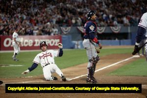 Braves' Mark Lemke scores in the bottom of the third, World Series Game Two, 1995