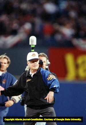 Former President Jimmy Carter throws the first pitch during game 6 of the World Series, 1995