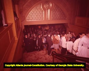 Crowds gather in the Fox Theatre's lounges during the opera's intermission, 1965