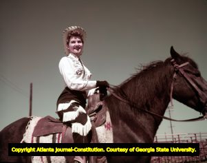 Women rodeo performer before the show, 1958