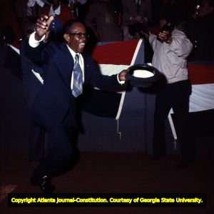 Hank Aaron's father running to greet him after his 715th home run, 1974
