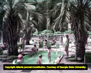 Children playing in a Savannah hotel's pool, 1954