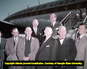 Adlai Stevenson is greeted at the airport by Gov. Talmadge and Mayor Hartsfield, 1953