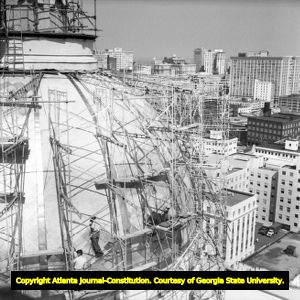 Construction workers work on renovating the Capitol dome, 1958
