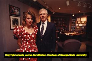 Ted Turner at his office in CNN center with daughter Laura, 1988