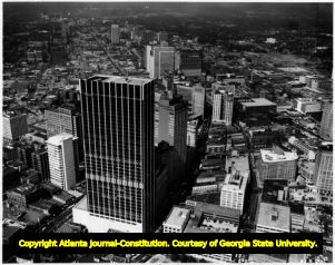Aerial view of downtown Atlanta; the large building under construction in the foreground is the First National Bank Building (later named Wachovia Bank of Georgia Building) at 2 Peachtree Street, Atlanta, Georgia. ca. 1966.