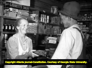 Customer at the small Whitener general store, 1950
