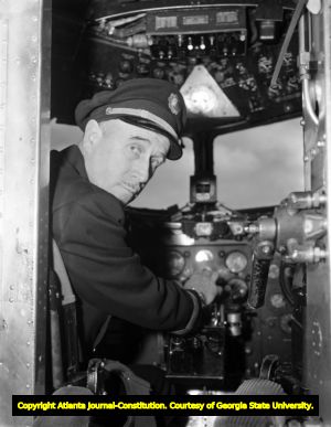 Interior of an Eastern Air Line's cockpit with Captain Shaffer, 1947