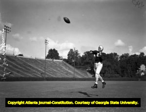 Action shot of Frank Sinkwich passing, 1944