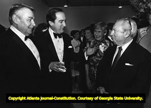 Conductor Robert Shaw with violinist Isaac Stern, and Robert Goizuetta, circa 1980s