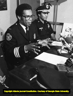 Police Chief George Napper during a press conference, 1982