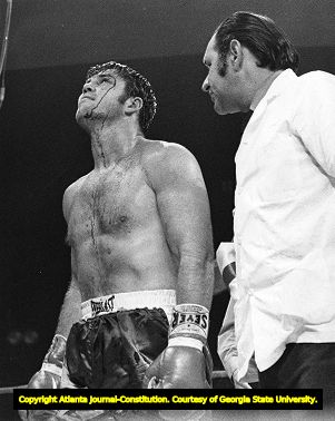 Boxer Jerry Quarry in the ring after losing to Muhammad Ali, 1970