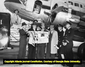 Atlanta Journal shipment of newspapers announcing German forces surrendering in Italy, 1945