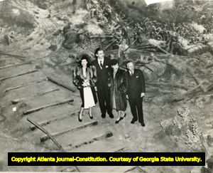 Stars from the film Gone with the Wind at the Atlanta Cyclorama, with George Simons, from the Atlanta City Parks Department, December 16, 1939.