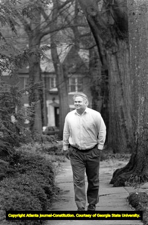 Author Pat Conroy walks around Ansley Park, 1988
