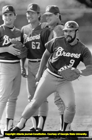 Atlanta Braves' catcher Ozzie Virgil warming up during spring training, 1987