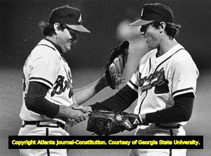 Pitcher Rich Mahler being congratulated by Gary Roenicke after winning the Braves season opener, 1987