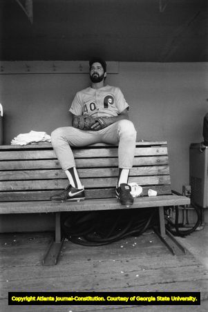 Former Braves pitcher Steve Bedrosian waits in the Phillies dugout to pitch, 1988