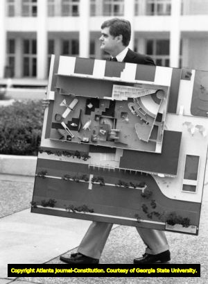 SciTrek director with an model of the proposed science museum, 1987