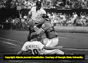 Atlanta Braves' catcher Bruce Benedict slides into home plate, 1982