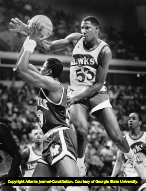 Atlanta Hawks Cliff Levingston swats Pat Ewing's shot, 1987