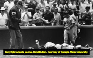 Braves' catcher Bruce Benedict is injured, but holds onto the ball and gets Franklin Stubbs at the plate, 1984