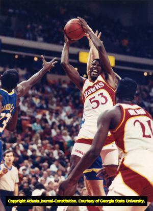 Hawks' Cliff Levingston claims a rebound, 1989