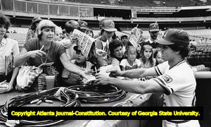 Atlanta Braves' Brett Butler signs autographs for fans, 1983