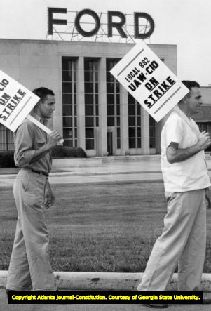United Auto Workers Local 882 members union picket outside the Ford Motor Company plant in Hapeville, 1955