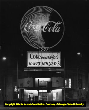Coca Cola neon sign above Margaret Mitchell Square, 1979