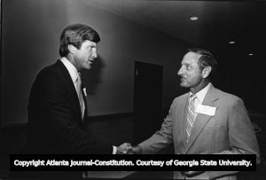 Bill Curry (left) shaking hands with Vince Dooley, Atlanta, Georgia, October 5, 1982.