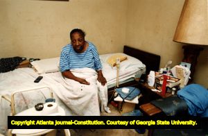 Elderly woman in public housing, confined to downstairs apartment without a bathroom, Atlanta, Georgia, October 28, 1993.
