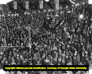 Crowds gather at a political rally to hear Governor Eugene Talmadge speak, 1930s