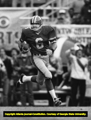 Atlanta Falcons' John James takes a bad snap for 13 yards and a first down, 1980
