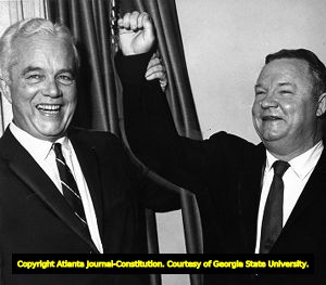 Coach Wally Butts with lawyer Will Schroder after winning his libel lawsuit against the Saturday Evening Post, 1963