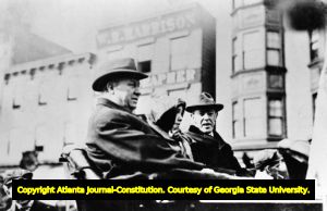 Governors Woodrow Wilson and Hoke Smith during the start of a good roads tour in Atlanta, 1910