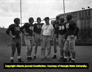 Georgia Tech Yellow Jacket team players with Coach W. A. Alexander, 1940s